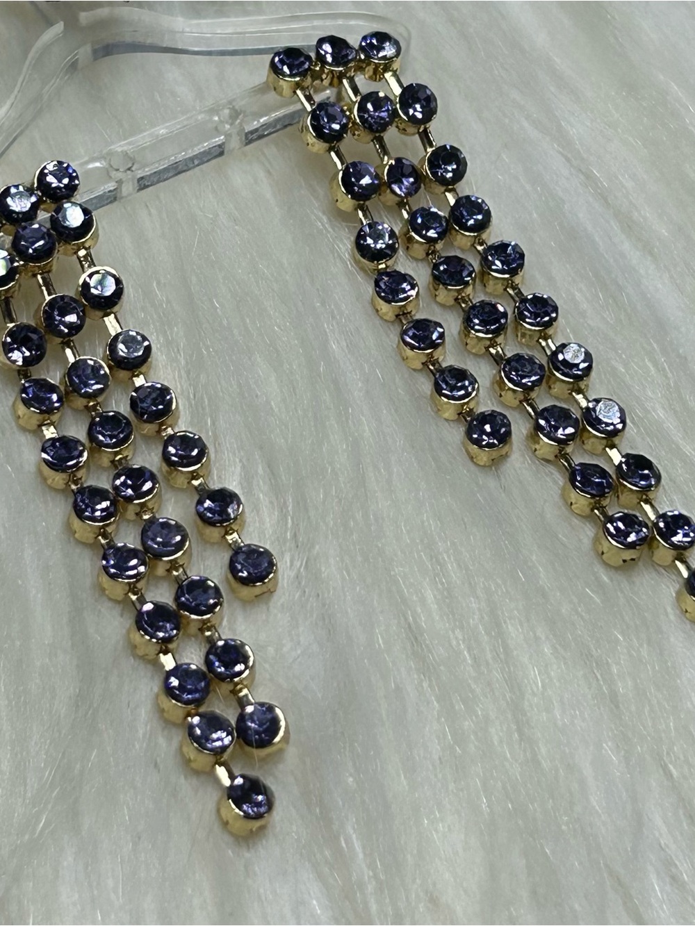 Purple faceted rhinestones graduated dangle gold tone earrings